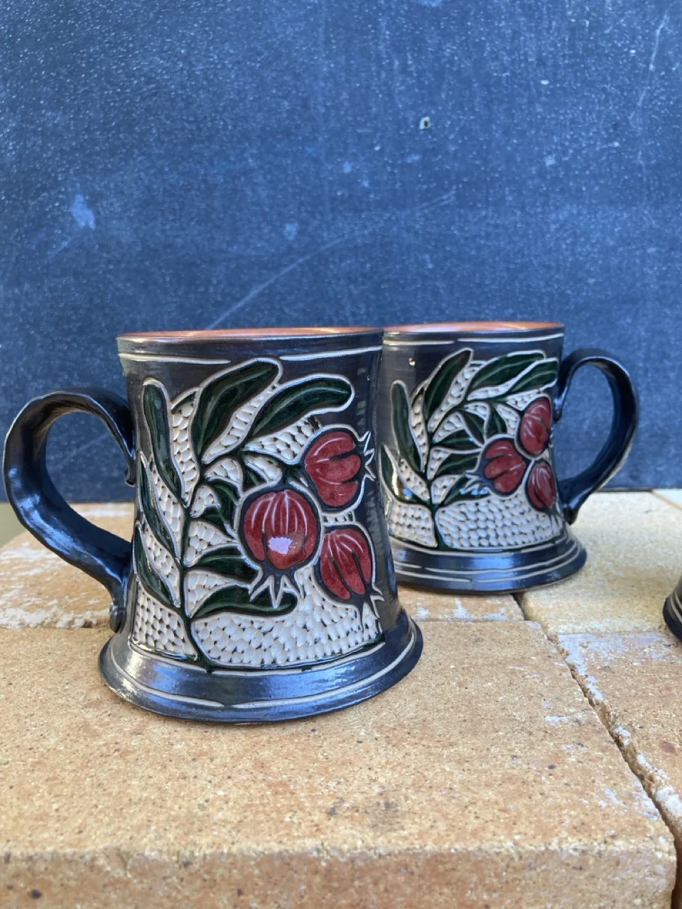 Two pomegrantate mugs